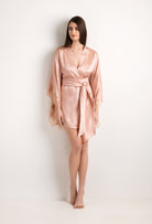 Explore the lingerie collection Summer 2022 from the house Carine Gilson with this Short Kimono Butterfly Sleeves in light rose Silk with nude lace
