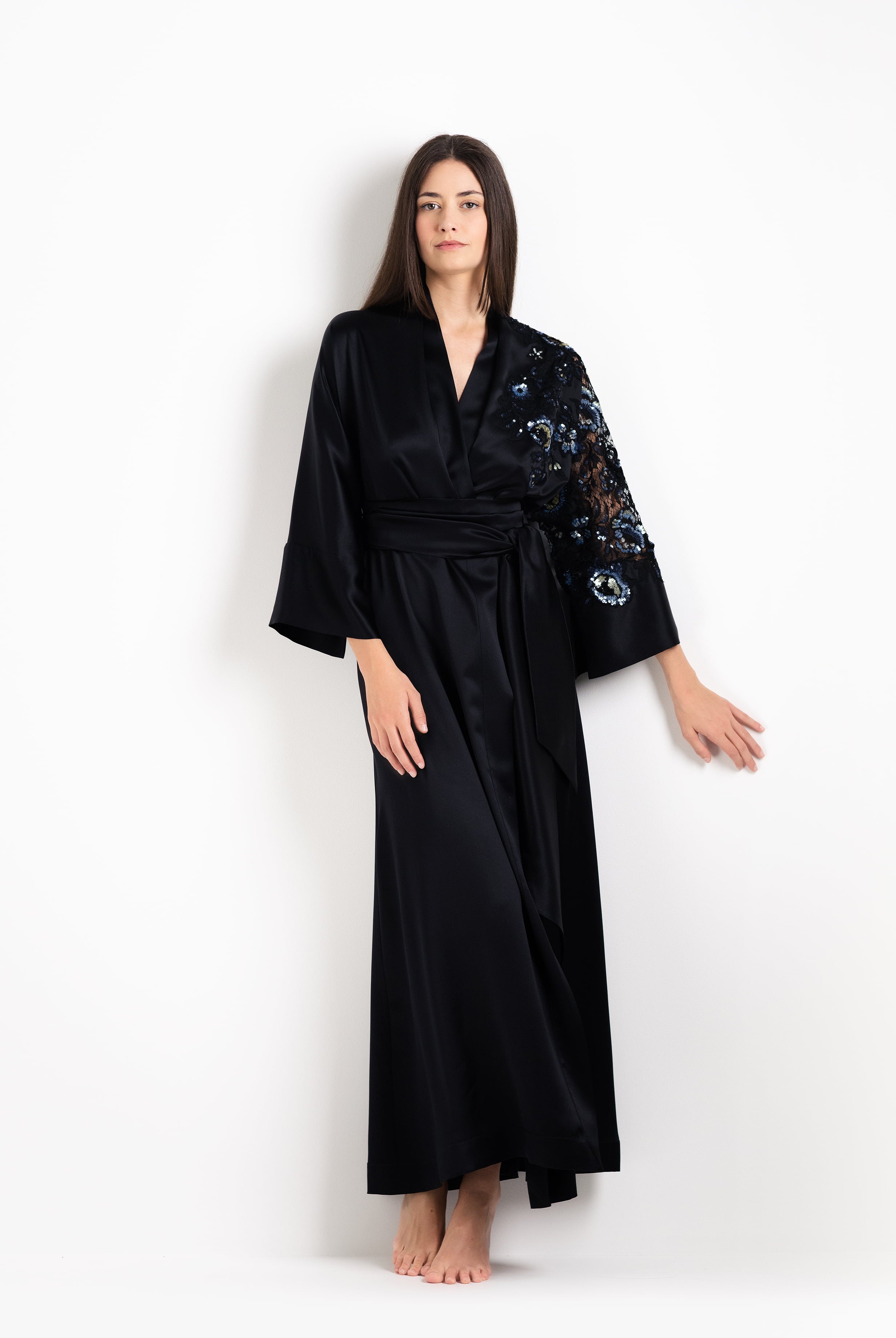 Woman wearing a black kimono-style robe with floral embroidery - Silk and lace