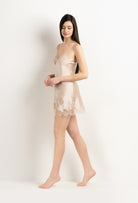 The 2025 Winter collection from the house Carine Gilson - The most beautiful couture lingerie to be discovered with this Slip Babydoll Style V Neckline in sand beige Silk  with ivory lace