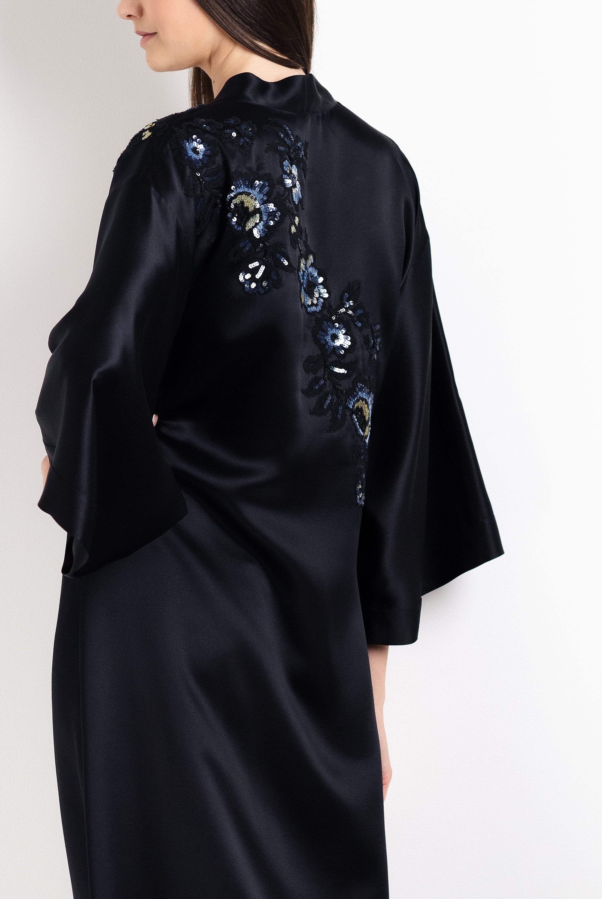 Enter Carine Gilson's world and the most beautiful silk and lace collection with the 2026 Cruise with this Long V Neck Kaftan in black Silk with Sparkling black lace