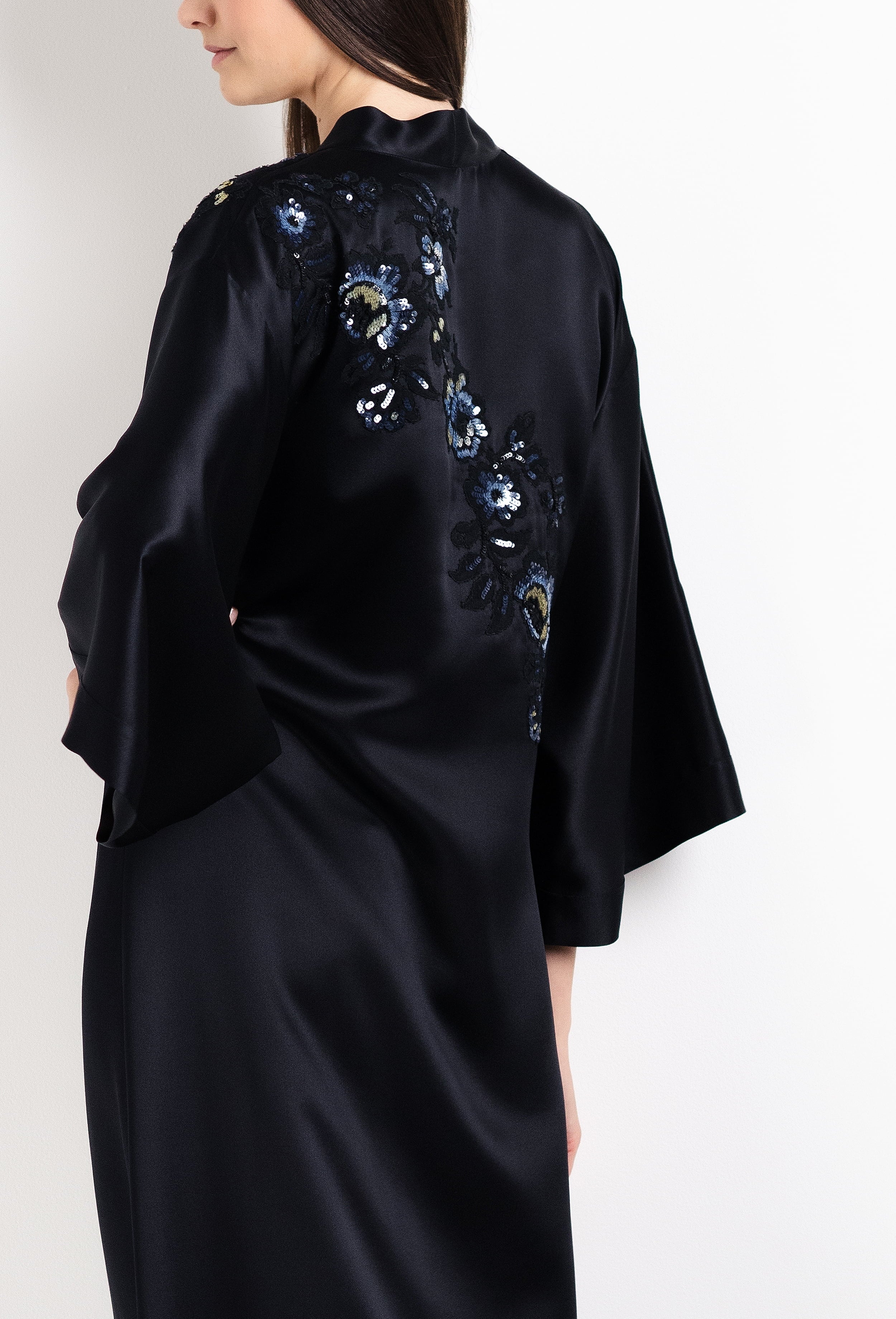 Enter Carine Gilson's world and the most beautiful silk and lace collection with the 2026 Cruise with this Long V Neck Kaftan in black Silk with Sparkling black lace