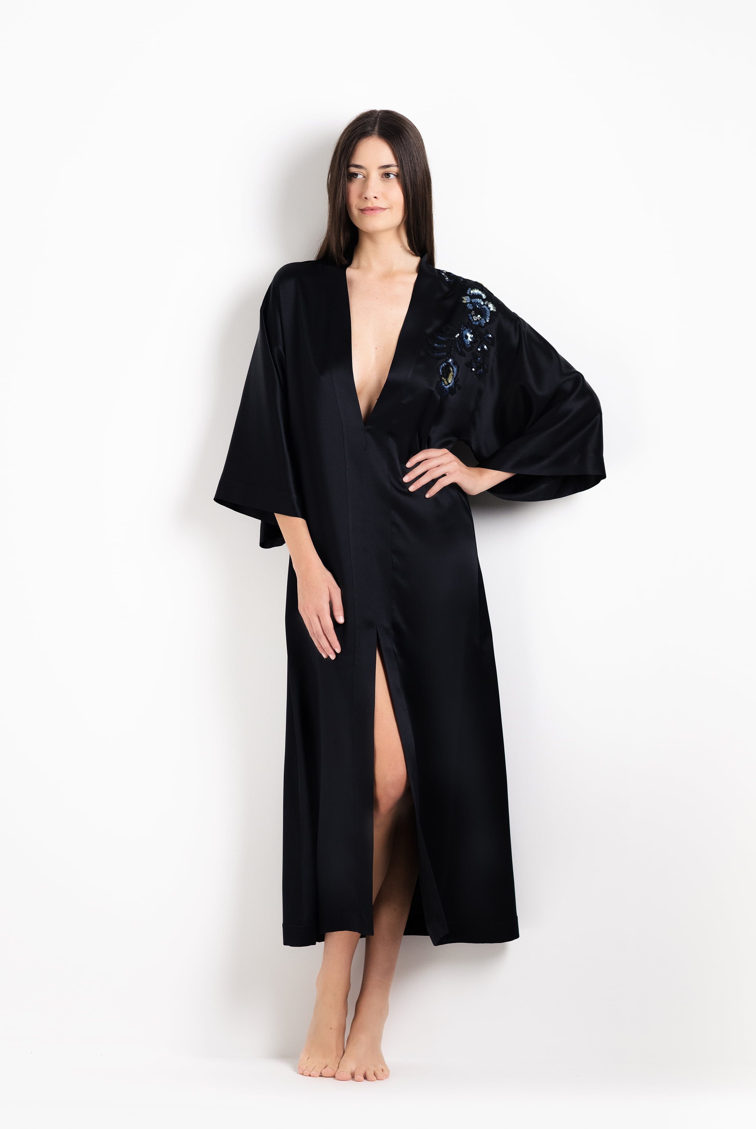 Enter Carine Gilson's world and the most beautiful silk and lace collection with the 2026 Cruise with this Long V Neck Kaftan in black Silk with Sparkling black lace