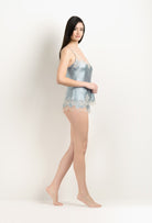 Enjoy the 2025 Winter collection of lingerie couture from the house Carine Gilson with this Camisole V Neckline in Frozen blue Silk  with ivory lace