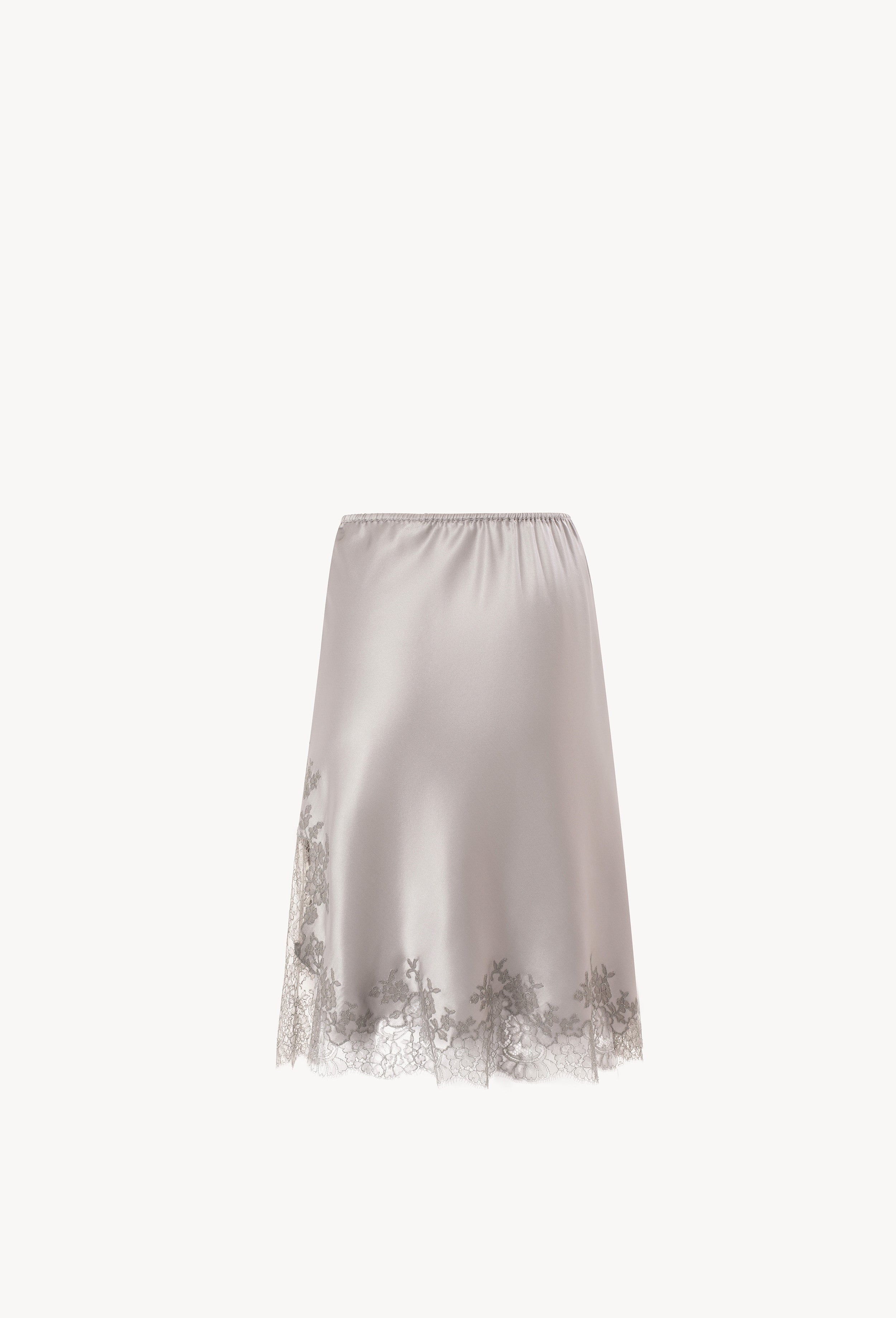 Discover the Hiver 2026-27 collection of lingerie couture from the house Carine Gilson with this skirt in leadgrey silk with grey lace