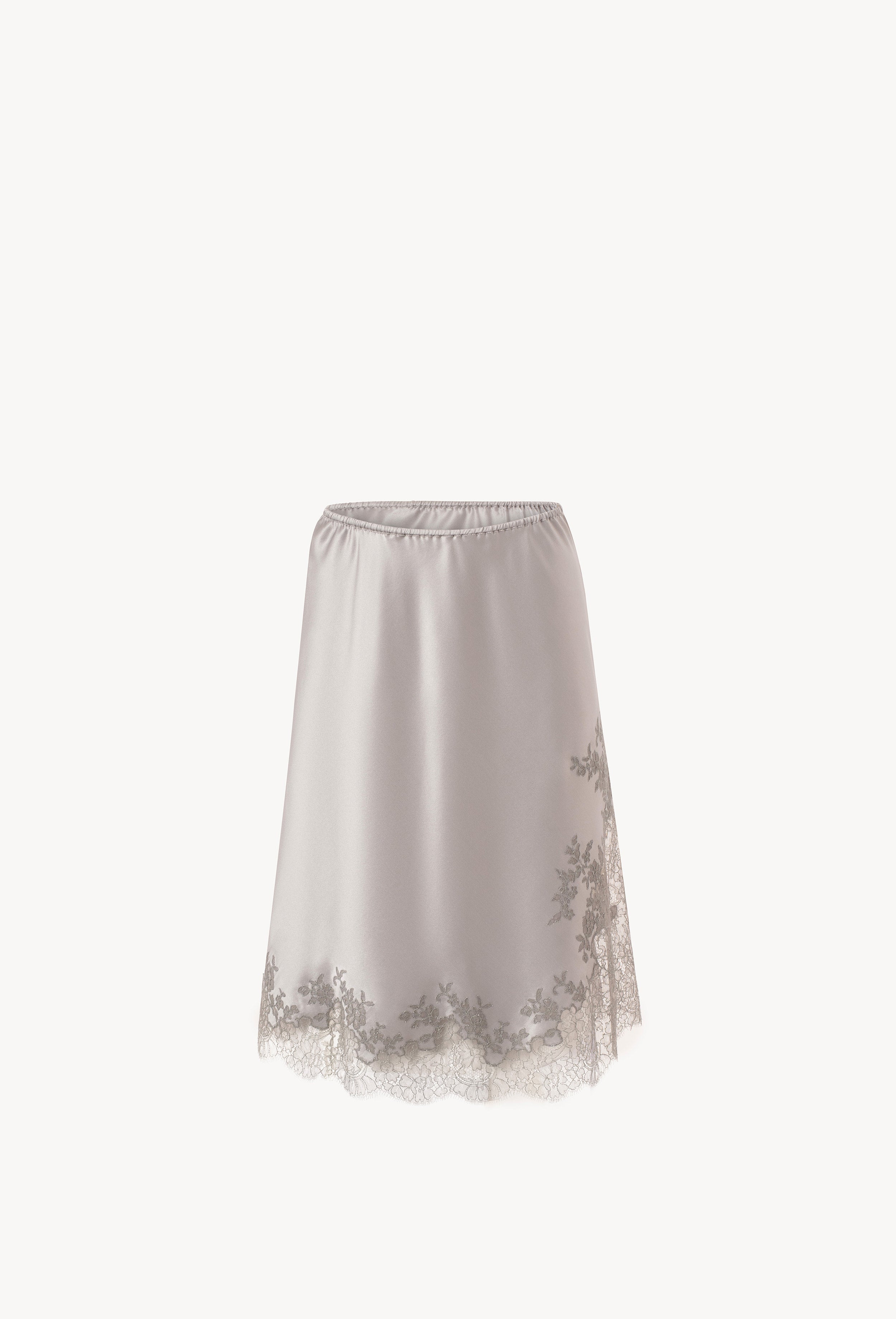 Discover the Hiver 2026-27 collection of lingerie couture from the house Carine Gilson with this skirt in leadgrey silk with grey lace