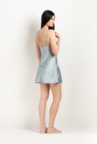 Discover the 2025 Winter collection of lingerie couture from the house Carine Gilson with this Slip Babydoll Style Straight Neckline in Frozen blue Silk  with ivory lace