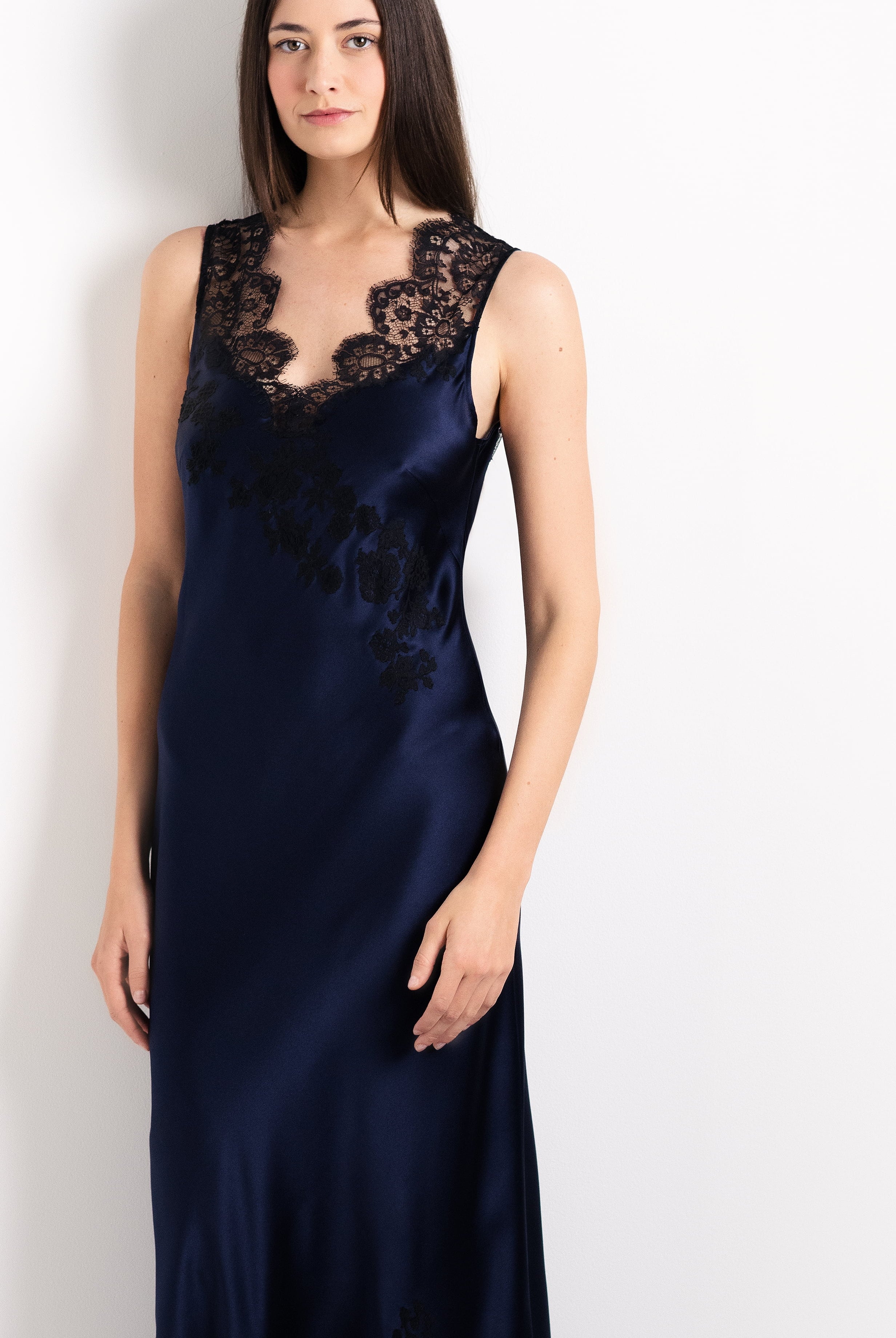 Enjoy the 2026 Cruise collection from the house Carine Gilson with this Long Gown V Neckline in Dark Marine Blue Silk with black lace