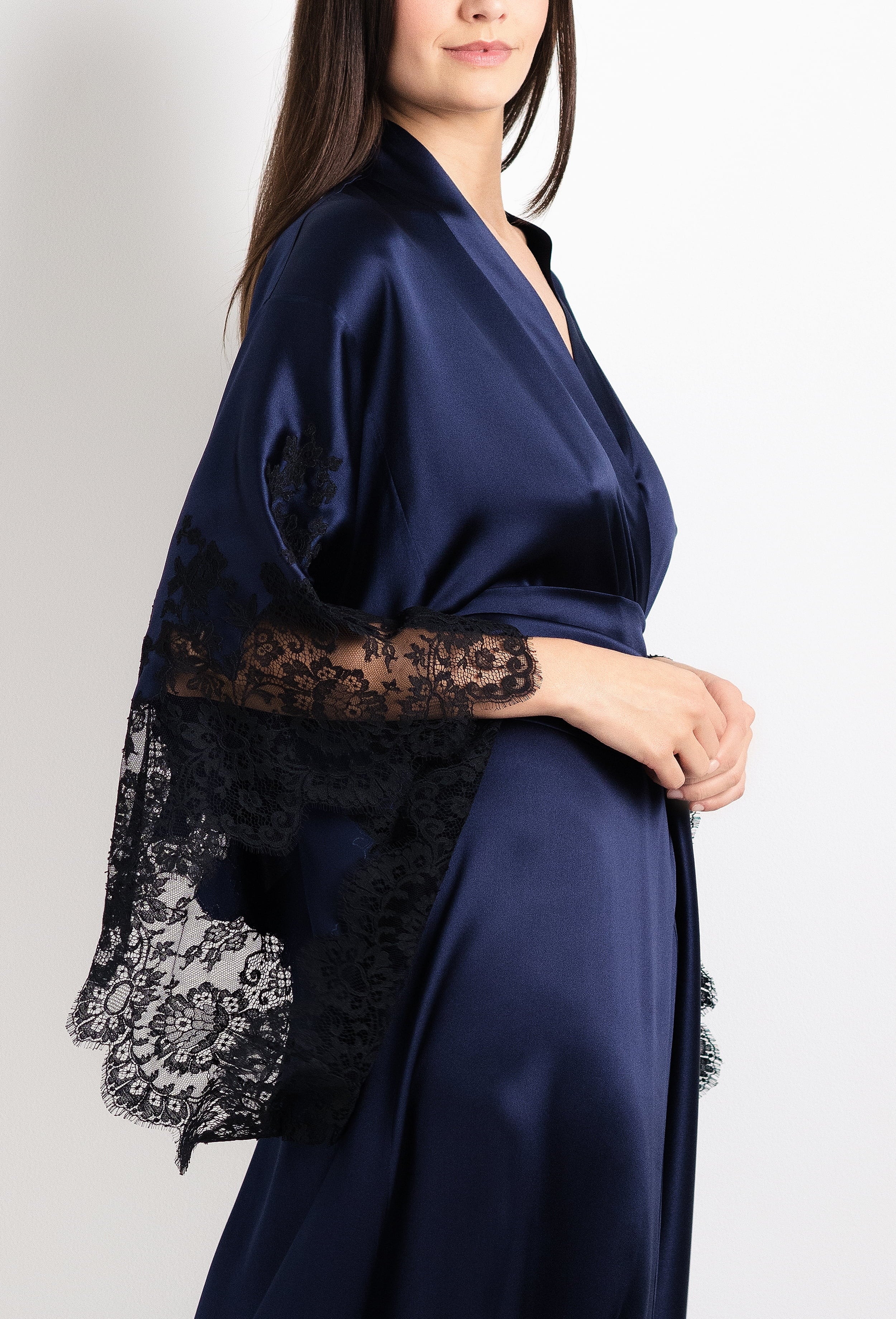 Discover the 2026 Cruise collection of silk and lace couture from the house Carine Gilson with this Long Kimono Butterfly Sleeves in Dark Marine Blue Silk with black lace