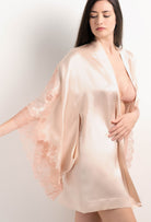 The 2025 Summer collection from the house Carine Gilson - The most beautiful couture lingerie to be discovered with this Short Kimono Butterfly Sleeves in powder pink Silk  with light rose lace