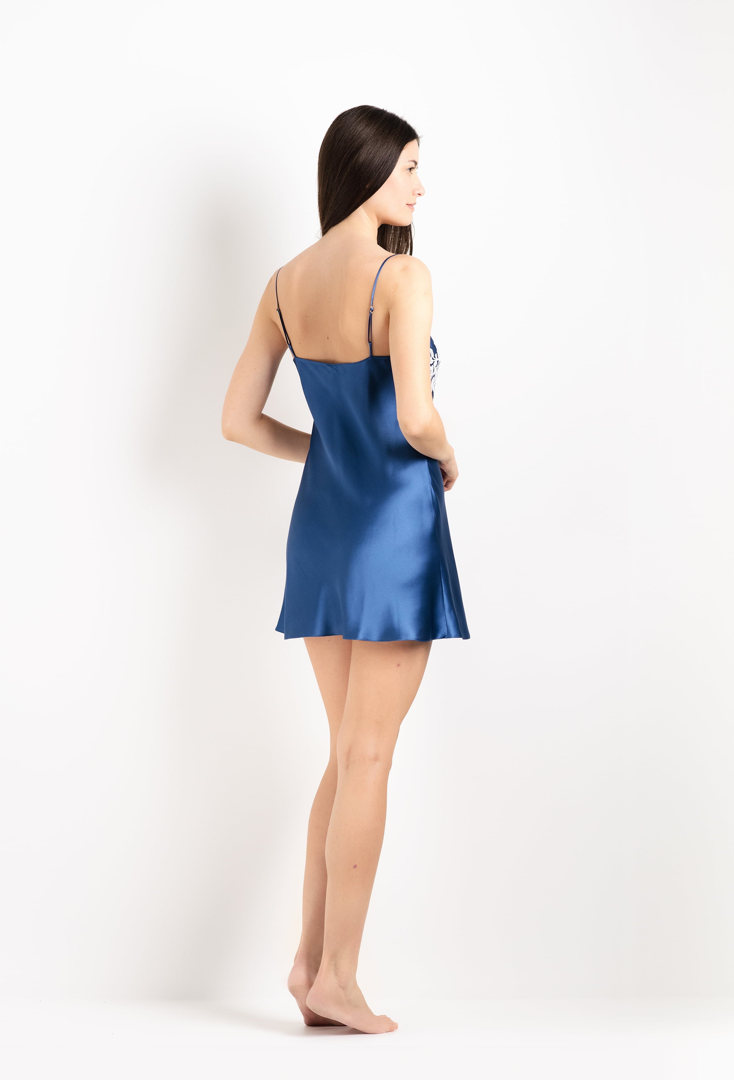 Discover the 2026 Cruise collection of silk and lace couture from the house Carine Gilson with this silk mini dress with straight neckline in Azur with Natural lace