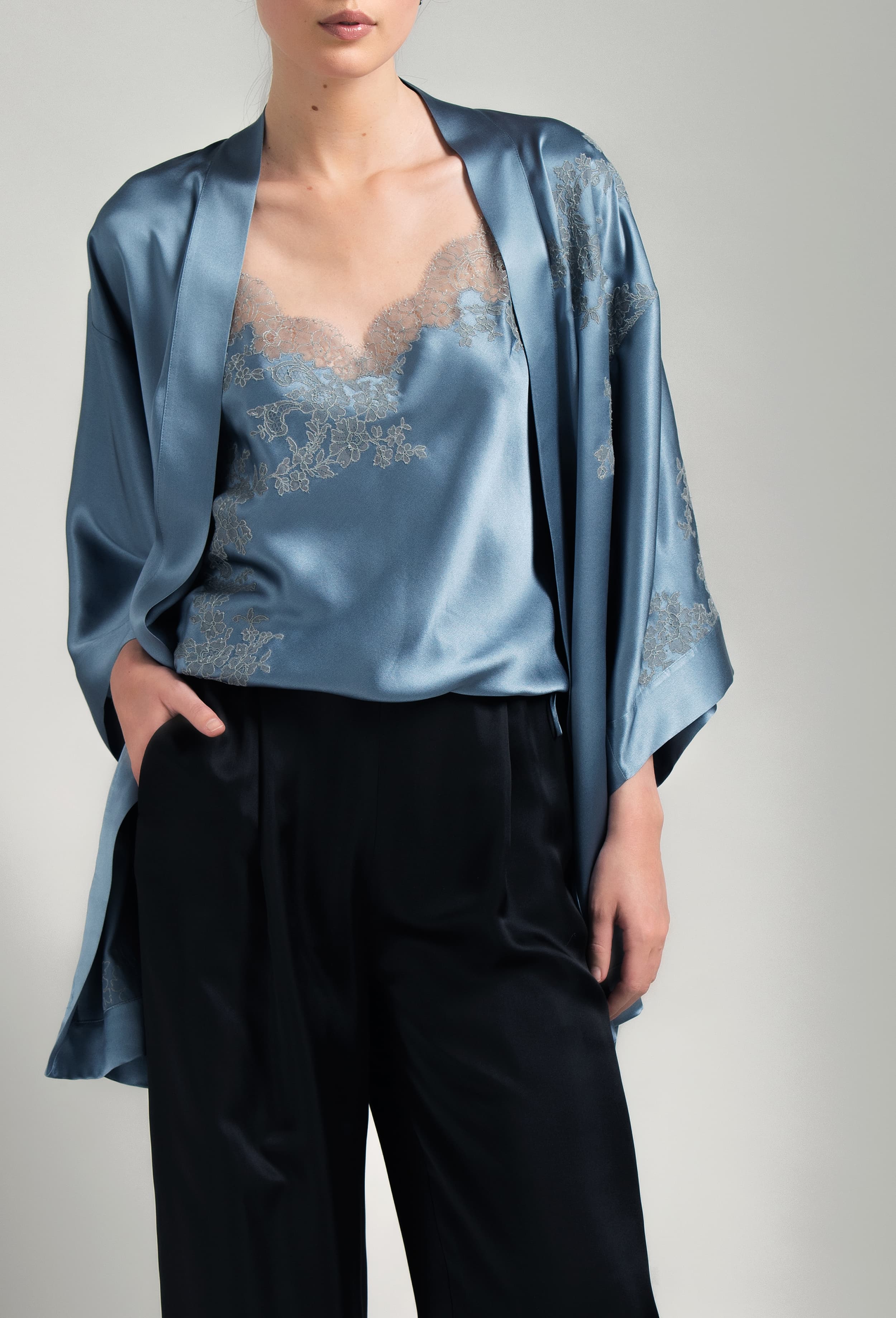 Discover the Hiver 2026-27 collection of lingerie couture from the house Carine Gilson with this camisole classic in blue stone silk with grey lace