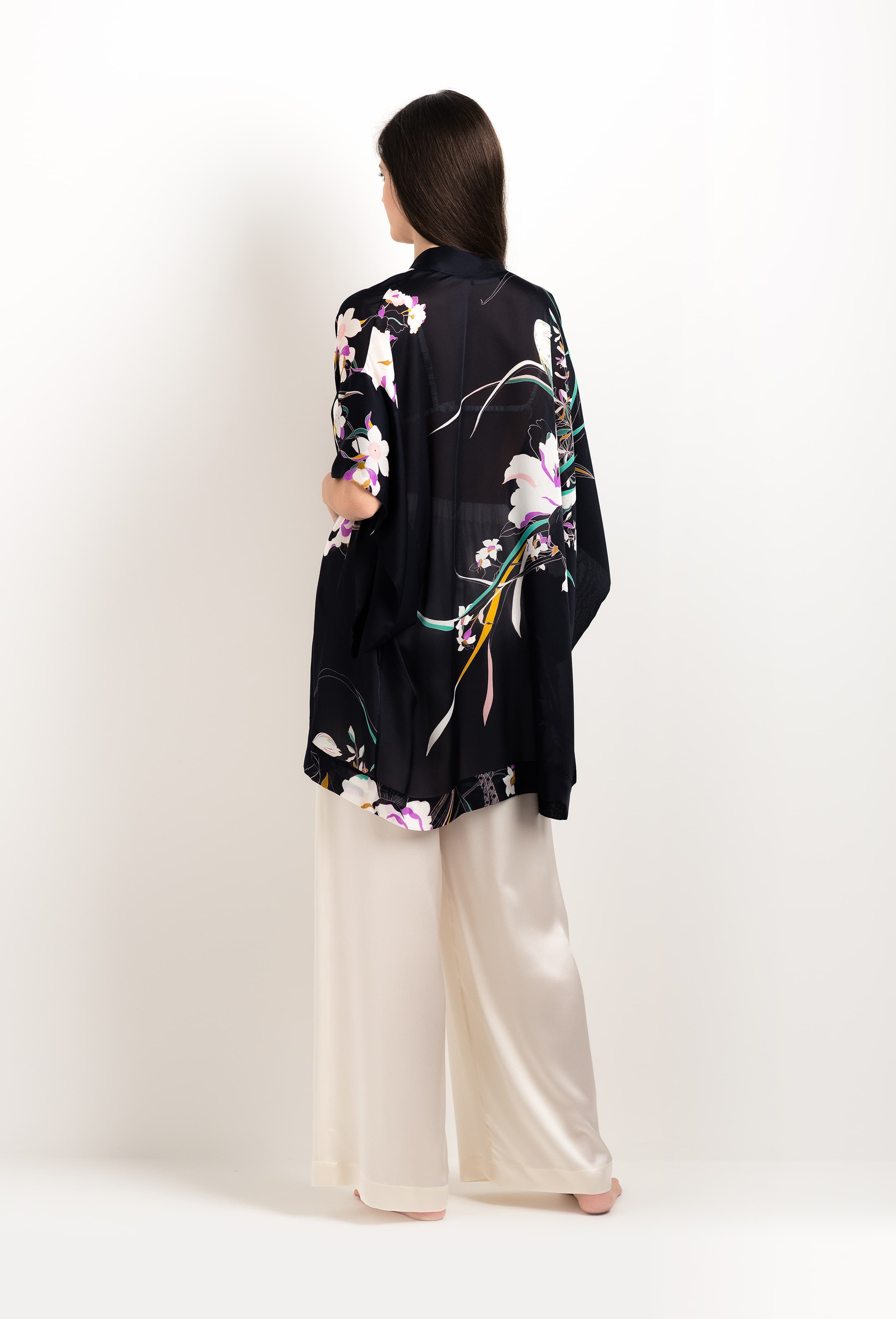 Enjoy the 2025 cruise collection of lingerie couture from the house Carine Gilson with this Short Kimono in Shadow of paradise Black Silk