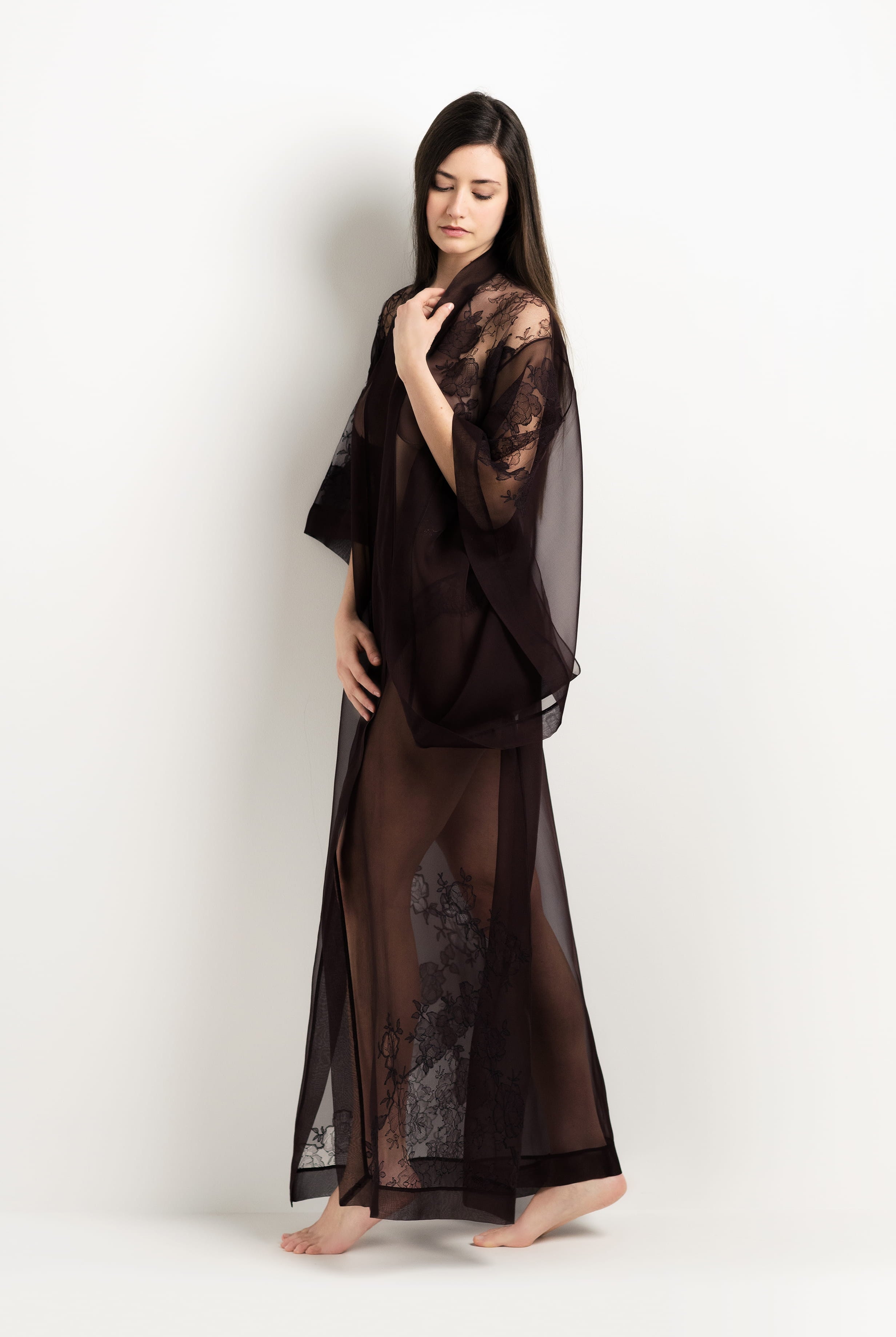 Discover the 2025 Winter collection of lingerie couture from the house Carine Gilson with this Long Kimono Butterfly Sleeves in Ebony Silk with Ebony lace