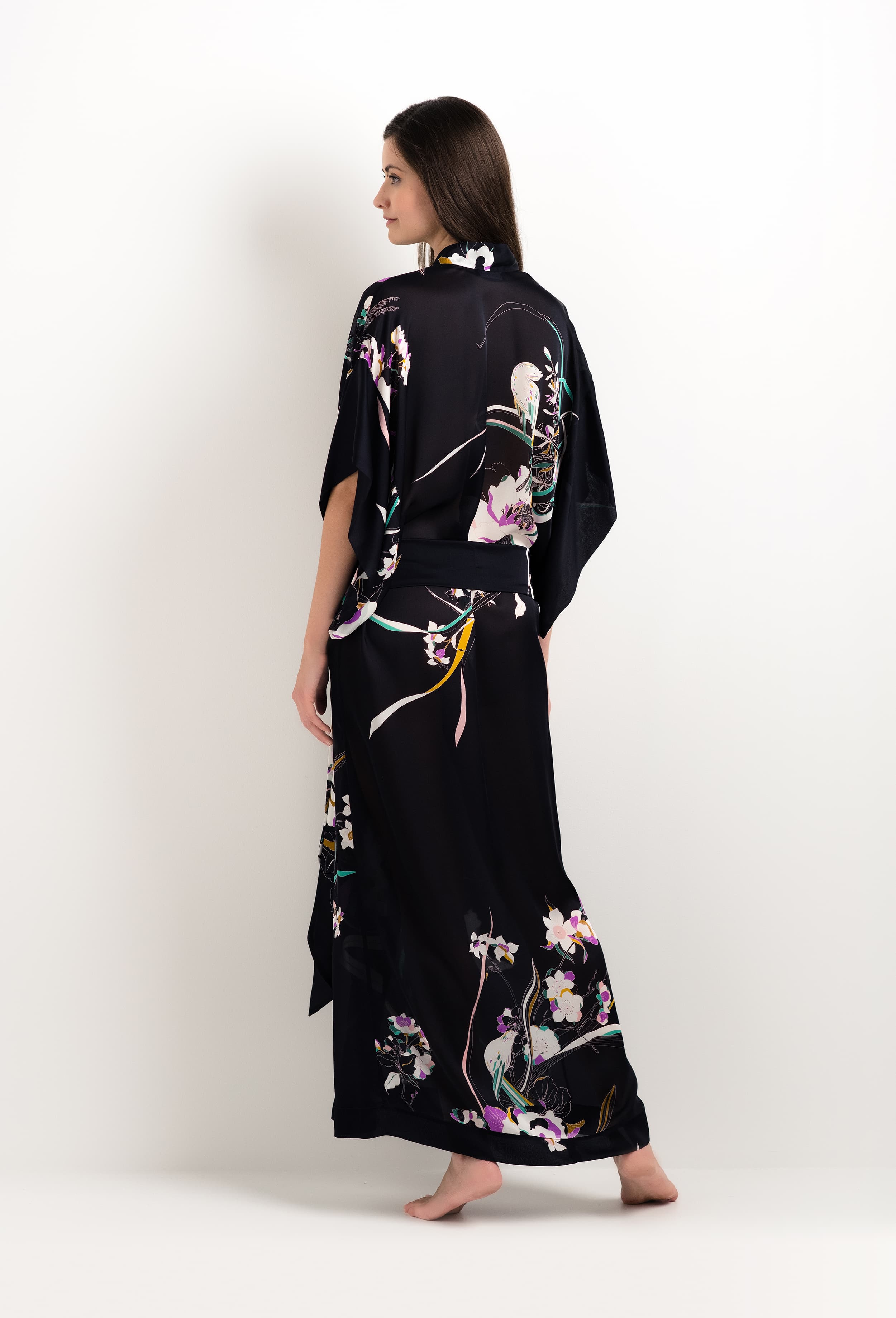 Made of silk and lace, explore the lingerie collection 2025 cruise from the house Carine Gilson with this Long Kimono Short Sleeves in Shadow of paradise Black Silk
