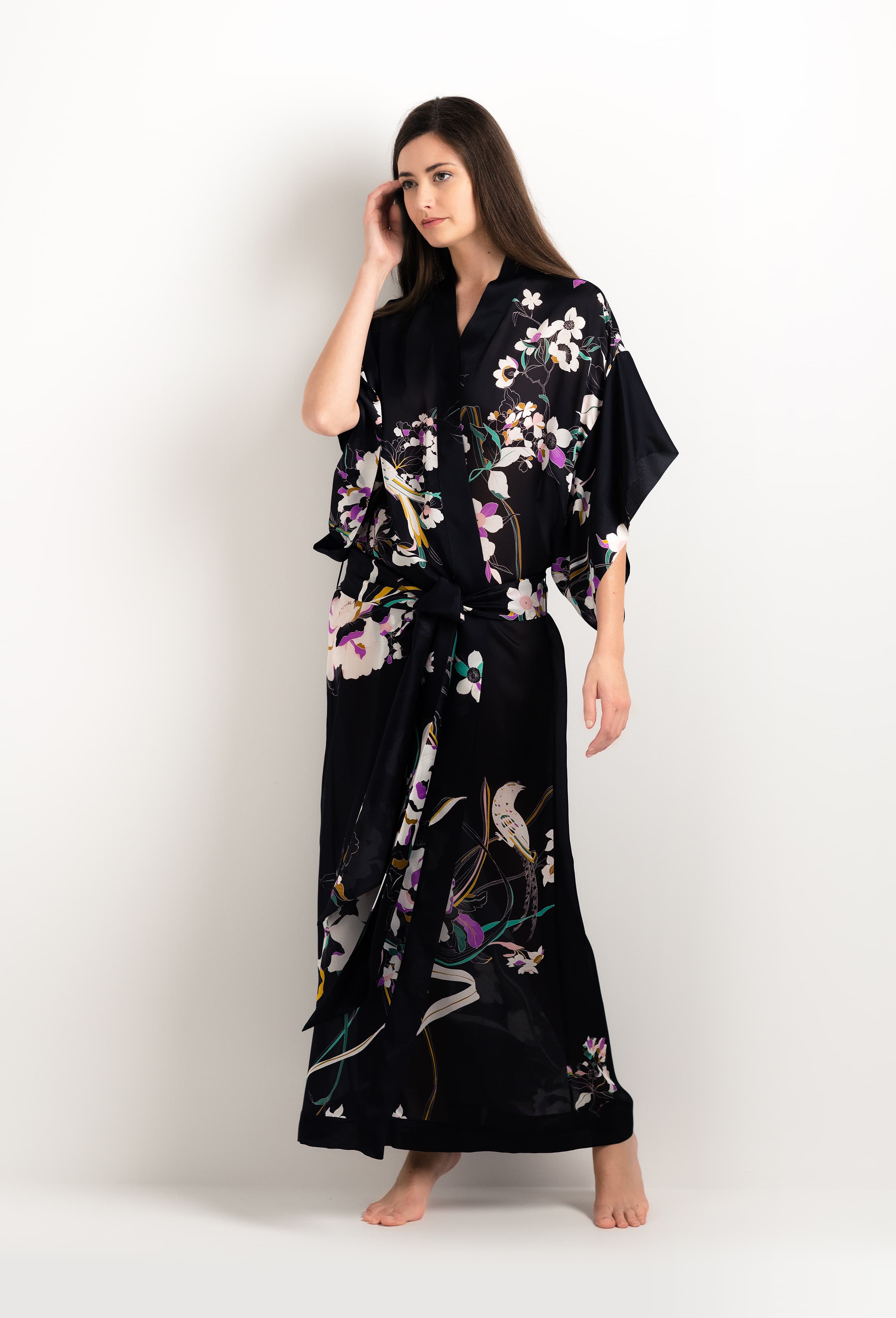 Made of silk and lace, explore the lingerie collection 2025 cruise from the house Carine Gilson with this Long Kimono Short Sleeves in Shadow of paradise Black Silk