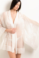 The 2025 Summer collection from the house Carine Gilson - The most beautiful couture lingerie to be discovered with this Short Kimono Butterfly Sleeves in Natural Silk  with Natural lace