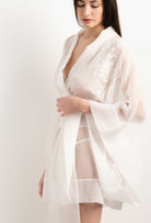 The 2025 Summer collection from the house Carine Gilson - The most beautiful couture lingerie to be discovered with this Short Kimono Butterfly Sleeves in Natural Silk  with Natural lace