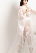 Discover the 2025 Summer collection of lingerie couture from the house Carine Gilson with this Long Kimono Butterfly Sleeves in Natural Silk  with Natural lace
