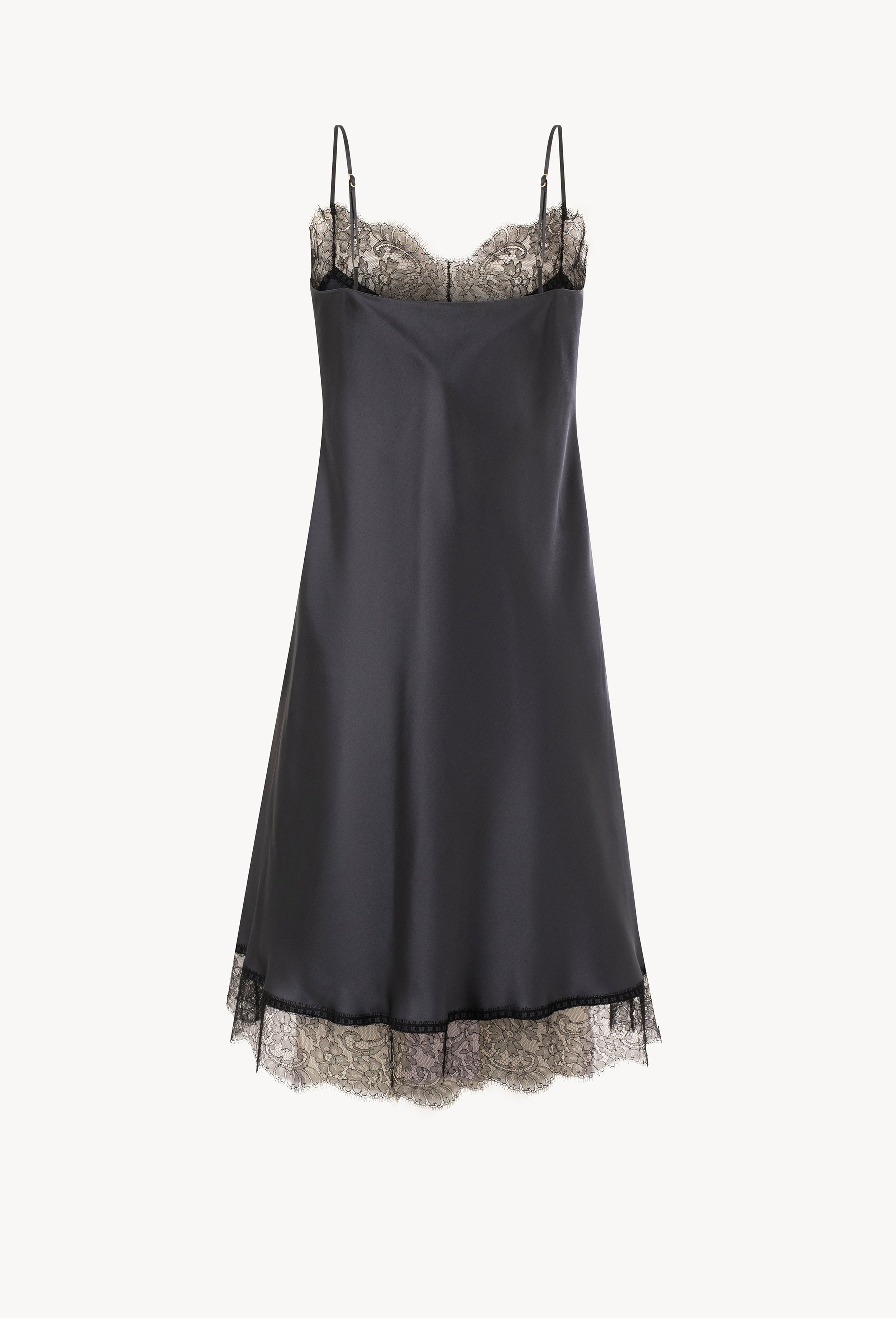 Enter Carine Gilson's world and the most beautiful silk lingerie with the Winter 2026-27 collection with this Midi dress with cuts in DarkGrey Silk with black lace
