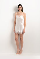 The 2025 Summer collection from the house Carine Gilson - The most beautiful couture lingerie to be discovered with this Slip Babydoll Style Straight Neckline in Natural Silk  with Natural lace