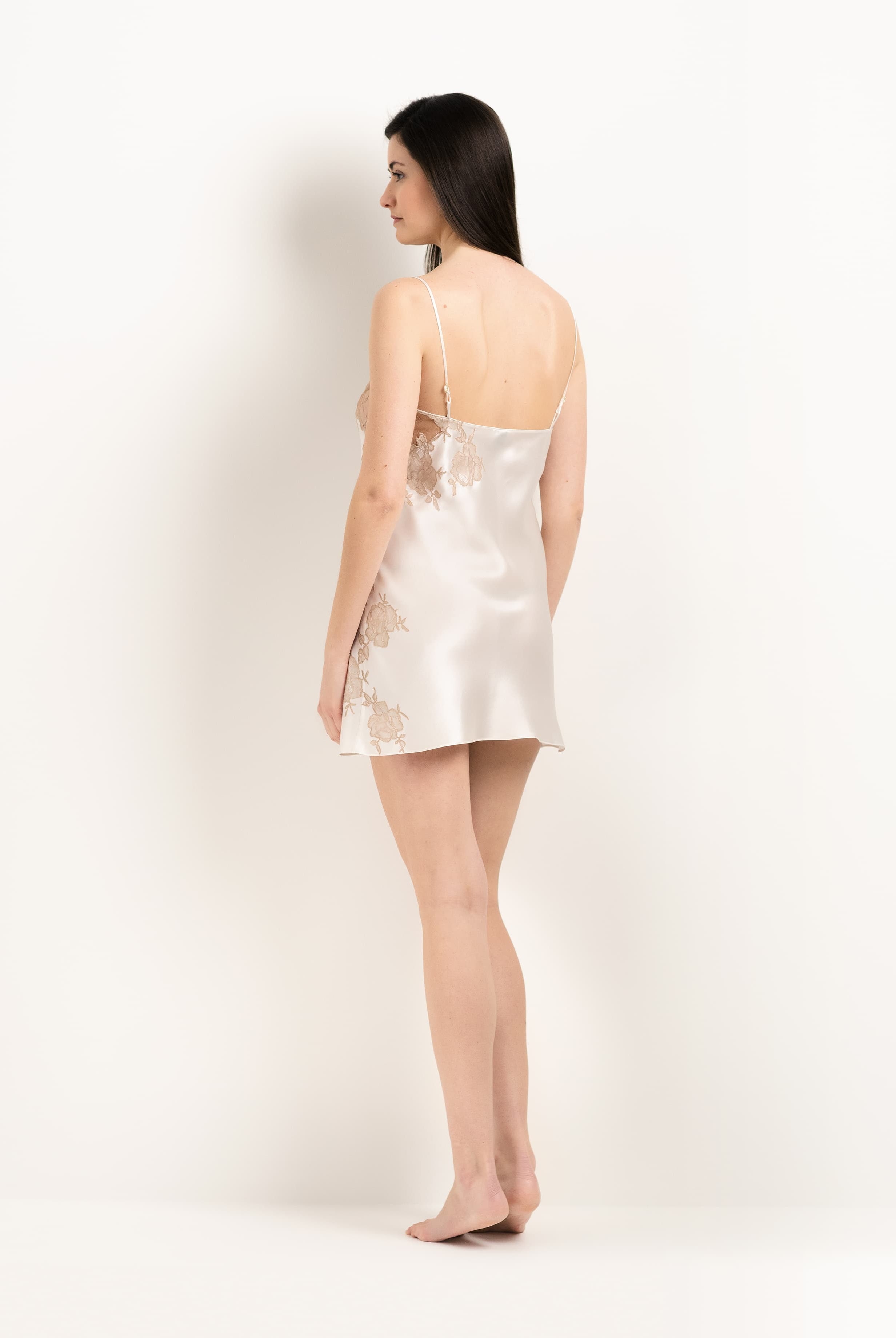 Discover the unique craftmanship of the belgian designer Carine Gilson in her atelier for the 2025 Winter collection with this Slip Babydoll Style Straight Neckline in ivory Silk with Vison lace