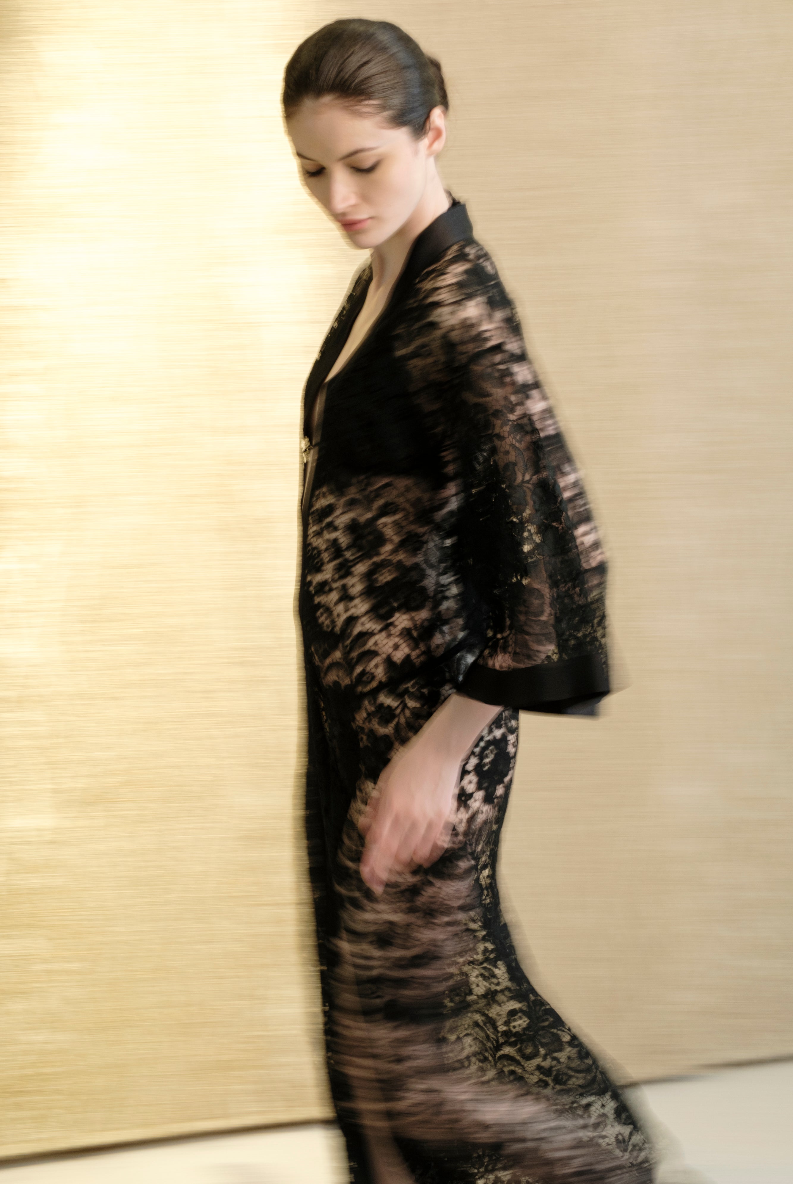 Discover the unique craftmanship of the belgian designer Carine Gilson in her atelier for the 2026 Cruise collection with this Long V Neck Kaftan in black Silk with black lace