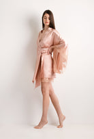 Explore the lingerie collection Summer 2022 from the house Carine Gilson with this Short Kimono Butterfly Sleeves in light rose Silk with nude lace