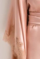 Explore the lingerie collection Summer 2022 from the house Carine Gilson with this Short Kimono Butterfly Sleeves in light rose Silk with nude lace