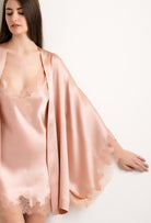 Explore the lingerie collection Summer 2022 from the house Carine Gilson with this Short Kimono Butterfly Sleeves in light rose Silk with nude lace