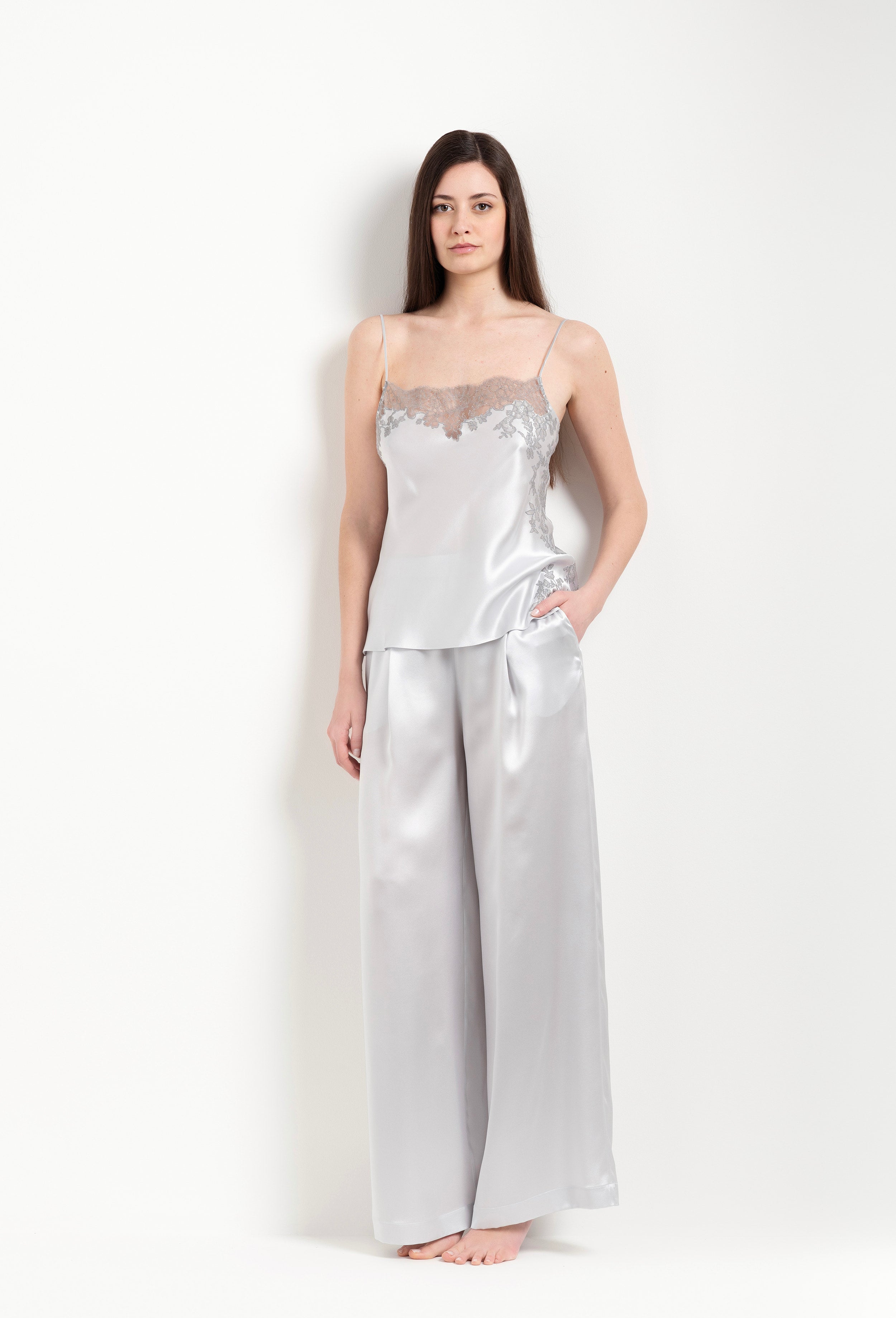 Discover the unique craftmanship of the belgian designer Carine Gilson in her atelier for the Hiver 2026-27 collection with this camisole straight neckline in silver grey silk  with grey lace