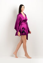 Enjoy the 2025 cruise collection of lingerie couture from the house Carine Gilson with this Short Kimono Butterfly Sleeves in violine Silk  with Black lace