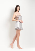 Enjoy the Hiver 2026-27 collection of lingerie couture from the house Carine Gilson with this babydoll style straight neckline in silver grey silk  with grey lace