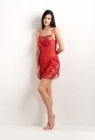 The 2025 summer collection from the house Carine Gilson - The most beautiful couture lingerie to be discovered with this Slip Babydoll Style Straight Neckline in Flam red Silk  with red lace