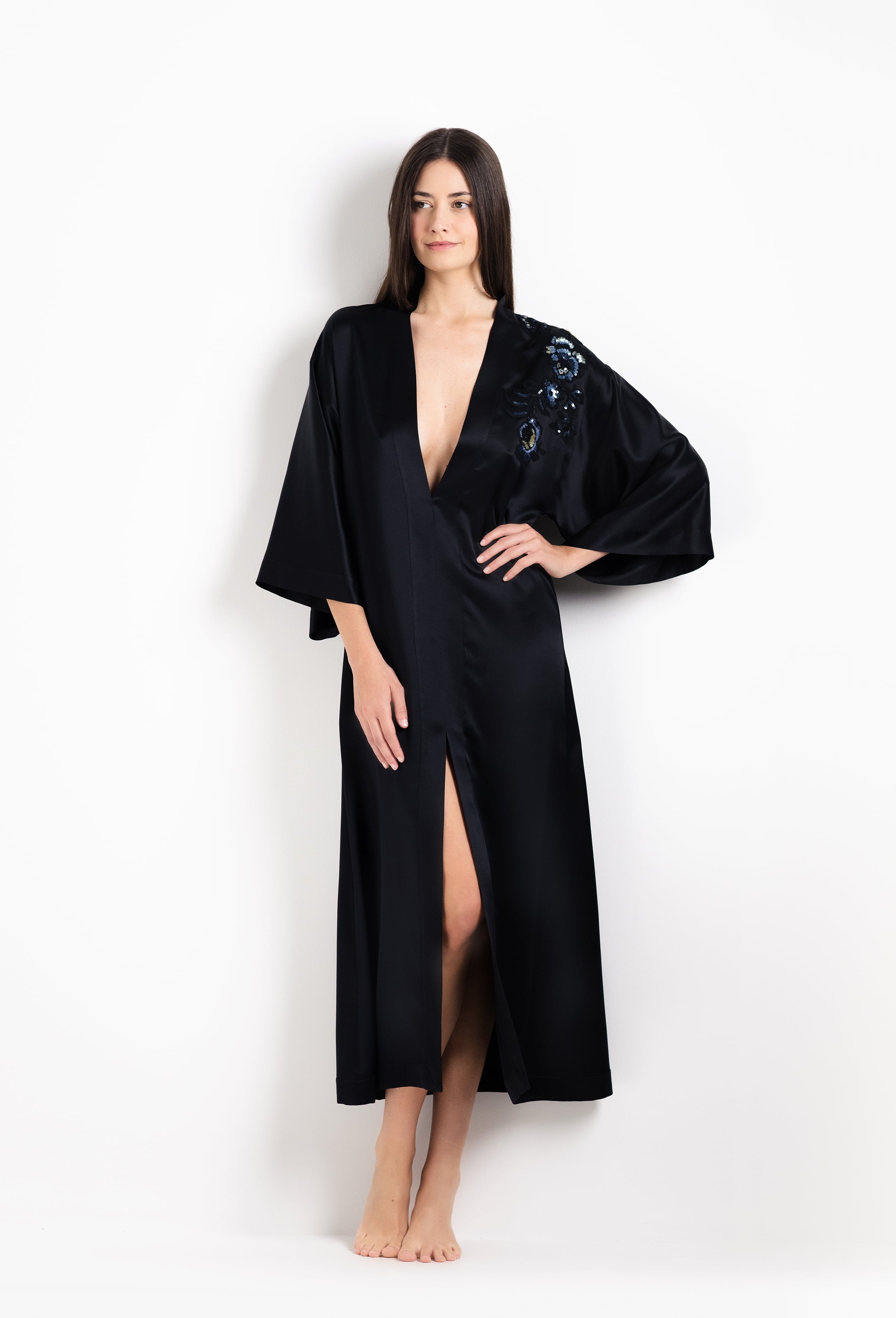 Enter Carine Gilson's world and the most beautiful silk and lace collection with the 2026 Cruise with this Long V Neck Kaftan in black Silk  with Sparkling black lace