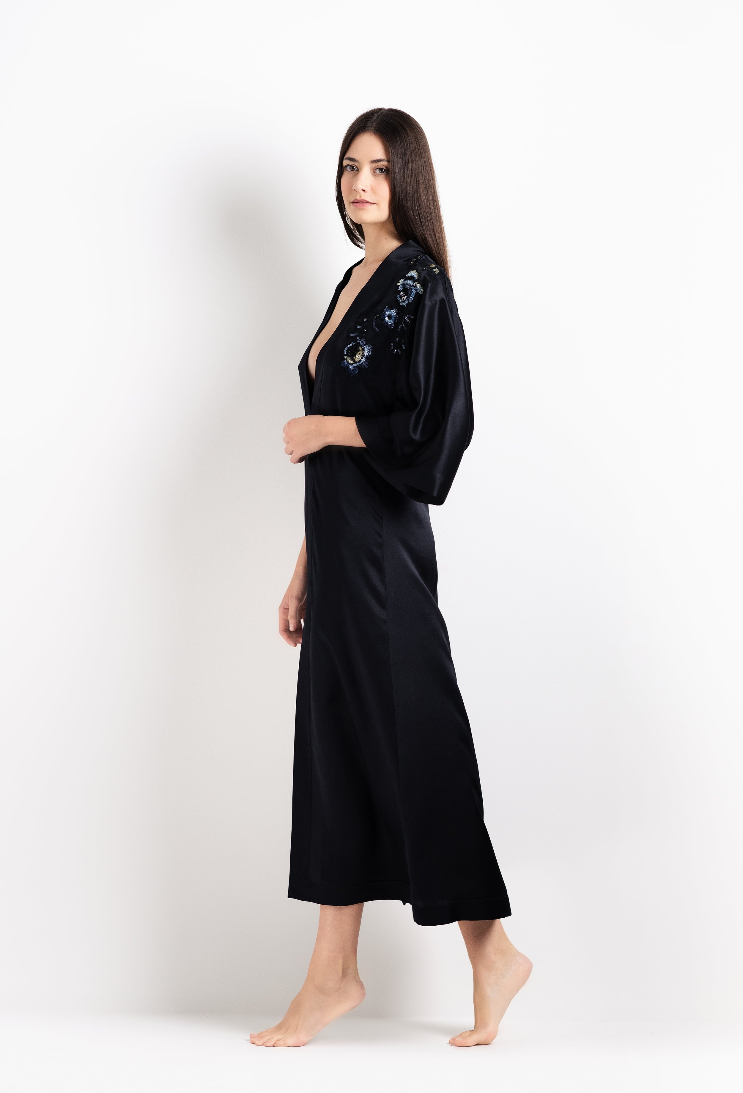 Enter Carine Gilson's world and the most beautiful silk and lace collection with the 2026 Cruise with this Long V Neck Kaftan in black Silk  with Sparkling black lace
