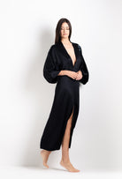 Enter Carine Gilson's world and the most beautiful silk and lace collection with the 2026 Cruise with this Long V Neck Kaftan in black Silk  with Sparkling black lace