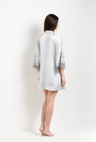 Discover the unique craftmanship of the belgian designer Carine Gilson in her atelier for the Hiver 2026-27 collection with this Short Kimono Classic Sleeves in Silver grey Silk  with Grey lace