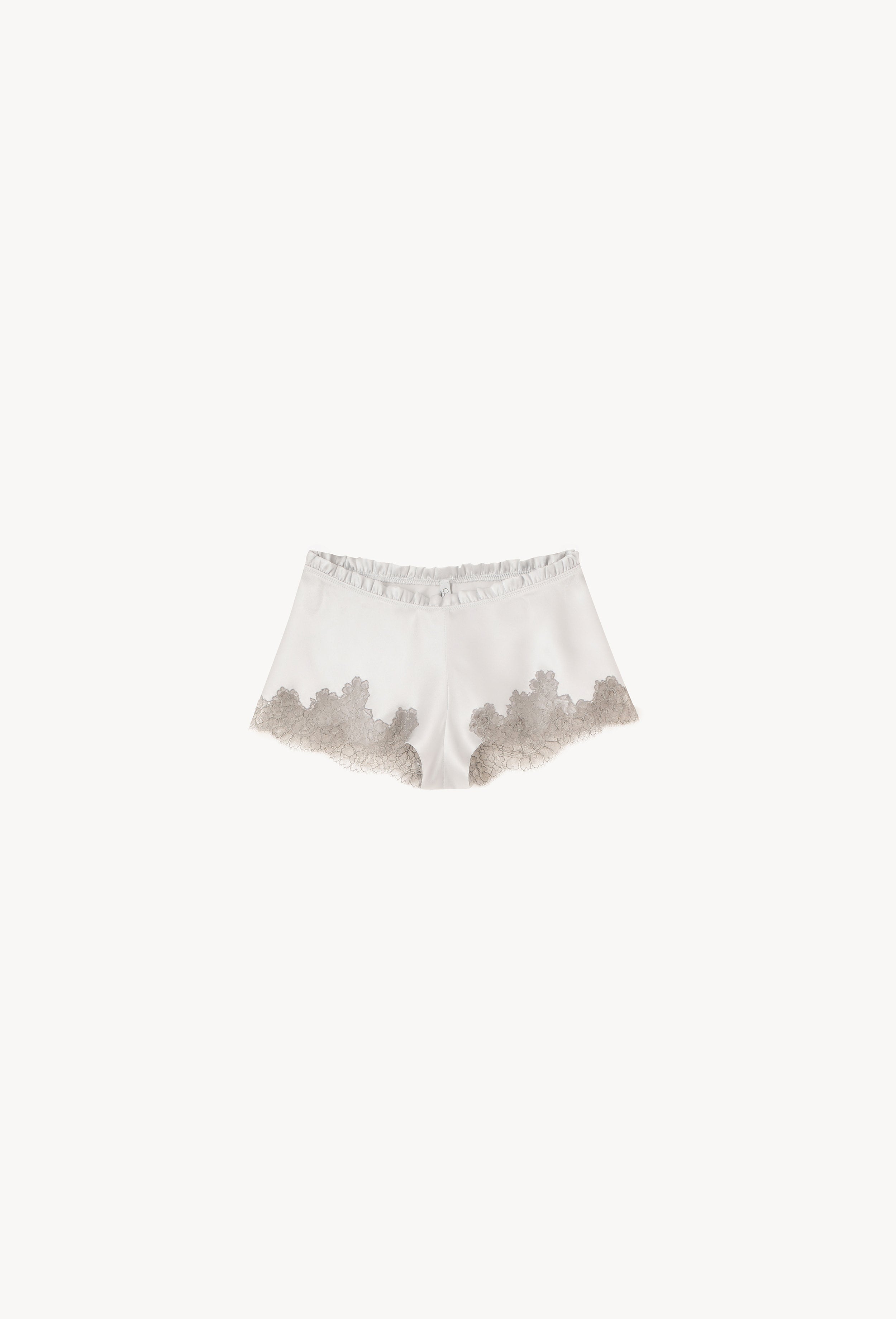 Enjoy the Hiver 2026-27 collection of lingerie couture from the house Carine Gilson with this Floaty Shorts in Silver grey Silk with Grey lace
