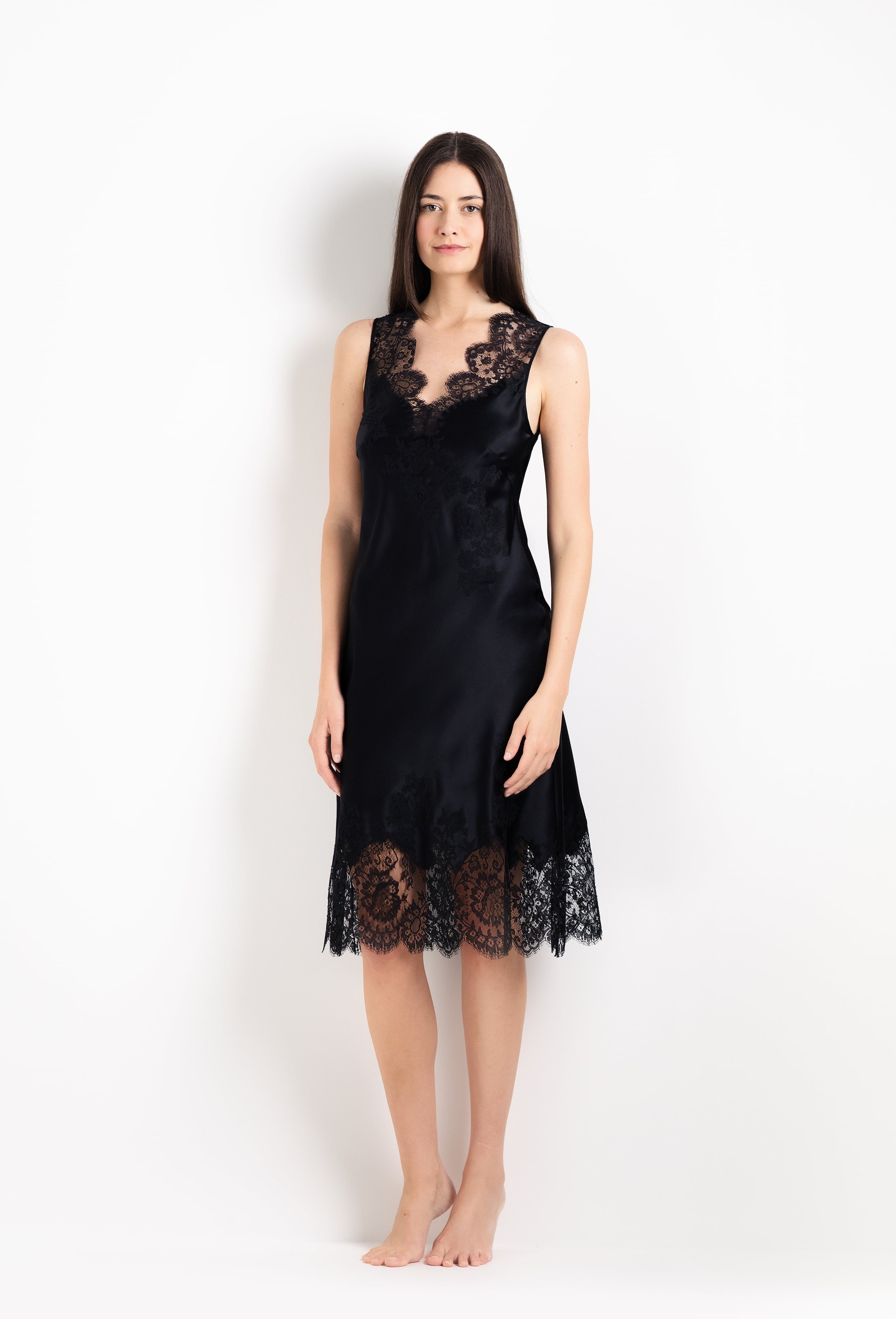 The 2026 Cruise collection from the house Carine Gilson - The most beautiful couture lingerie to be discovered with this Slip Dress V Neckline in black Silk  with black lace