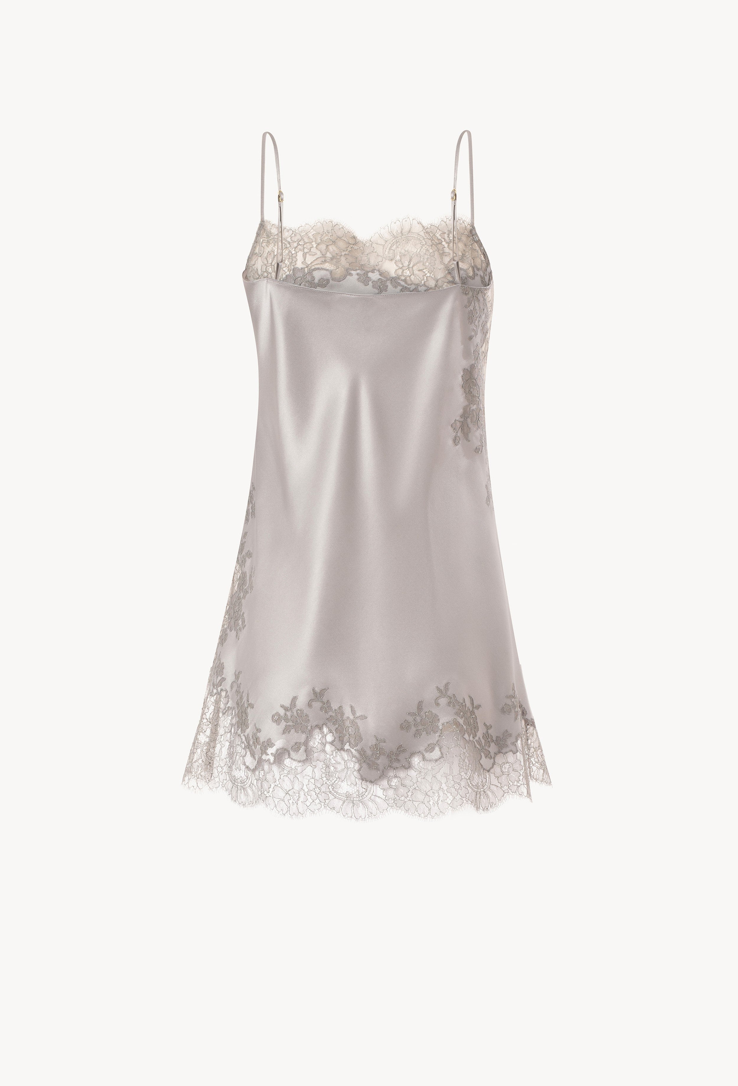 The Hiver 2026-27 collection from the house Carine Gilson - The most beautiful couture lingerie to be discovered with this babydoll style straight neckline in leadgrey silk with grey lace