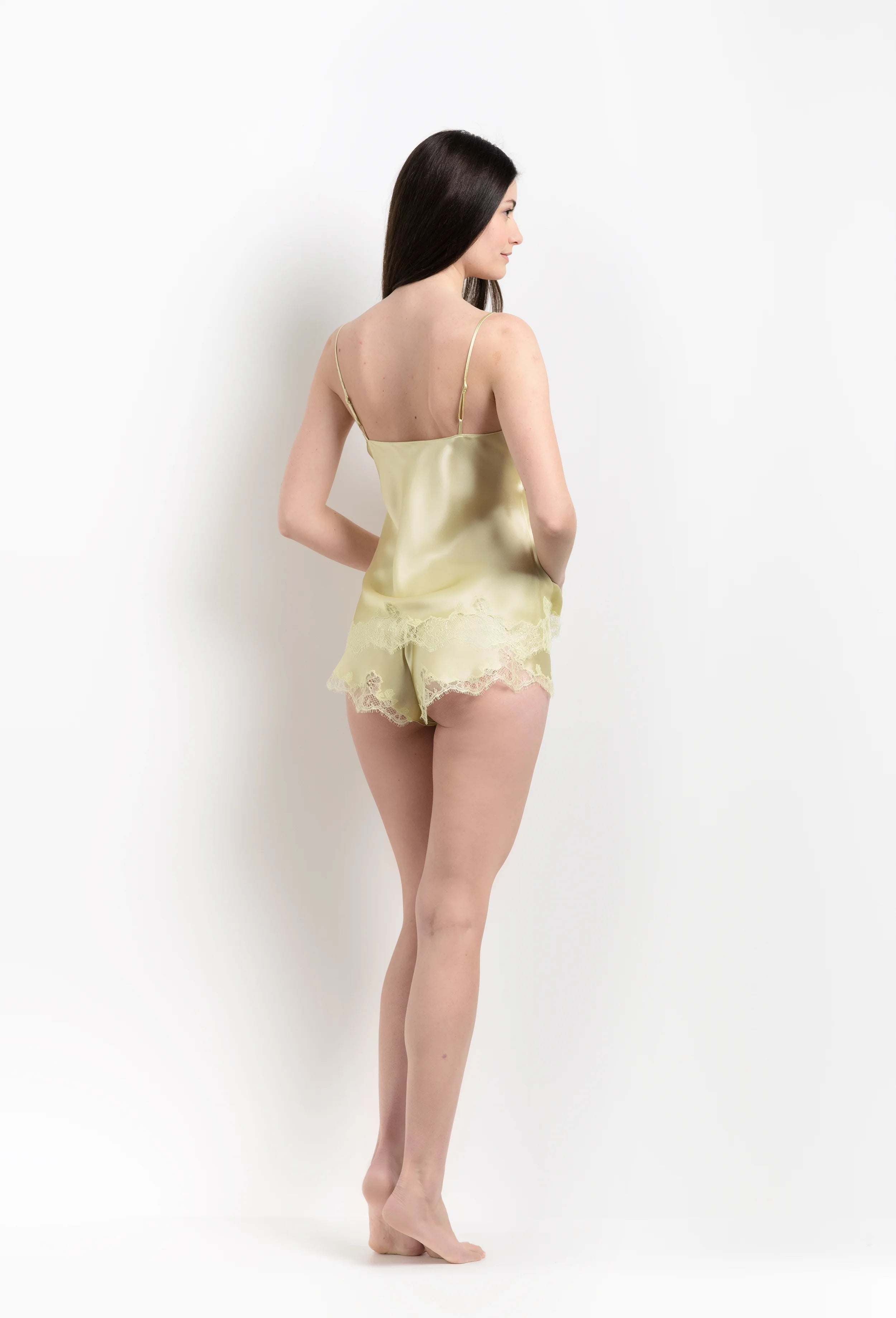 Enjoy the 2026 Summer collection of lingerie couture from the house Carine Gilson with this camisole straight neckline in light yellow silk with acid yellow lace