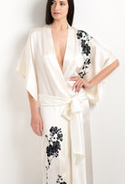 Made of silk and lace, explore the lingerie collection 2025 cruise from the house Carine Gilson with this Long Kimono Short Sleeves in Pearl Silk  with Black lace