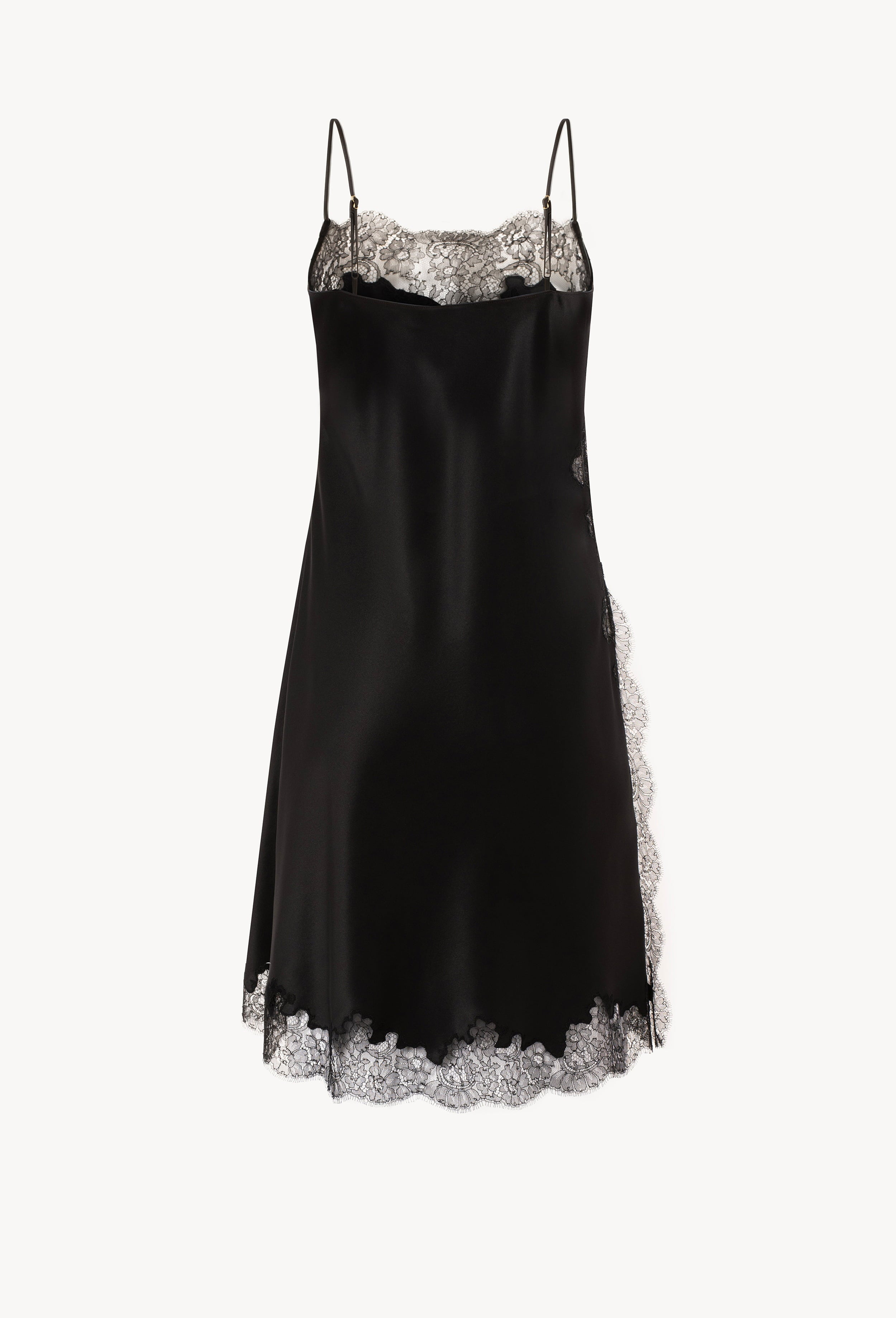 The Winter 2026-27 collection from the house Carine Gilson - The most beautiful couture lingerie to be discovered with this Midi dress Straight Neckline in black Silk  with black lace