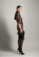 Enter Carine Gilson's world and the most beautiful silk lingerie with the Winter 2026-27 collection with this Long sleeves top in black lace