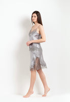 Discover the Hiver 2026-27 collection of lingerie couture from the house Carine Gilson with this skirt in leadgrey silk with grey lace