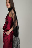 Made of silk and lace, explore the lingerie collection Winter 2026-27 from the house Carine Gilson with this Camisole Straight Neckline in Rubis red Silk  with Black lace