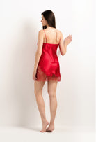 Enter Carine Gilson's world and the most beautiful silk lingerie with the 2025 summer  collection with this Slip Babydoll Style Straight Neckline in Flam red Silk  with red lace