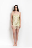 Discover the 2026 Summer collection of lingerie couture from the house Carine Gilson with this slip babydoll style straight neckline in light yellow silk with acid yellow lace