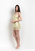 Discover the 2026 Summer collection of lingerie couture from the house Carine Gilson with this slip babydoll style straight neckline in light yellow silk with acid yellow lace