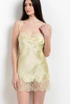 Discover the 2026 Summer collection of lingerie couture from the house Carine Gilson with this slip babydoll style straight neckline in light yellow silk with acid yellow lace
